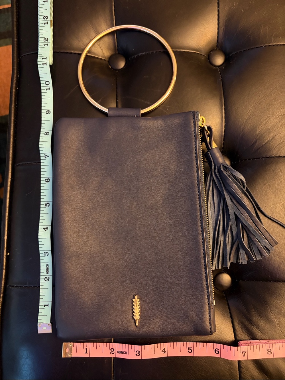 Thacker Navy Leather Ring-Handle Tassel Wristlet Bag